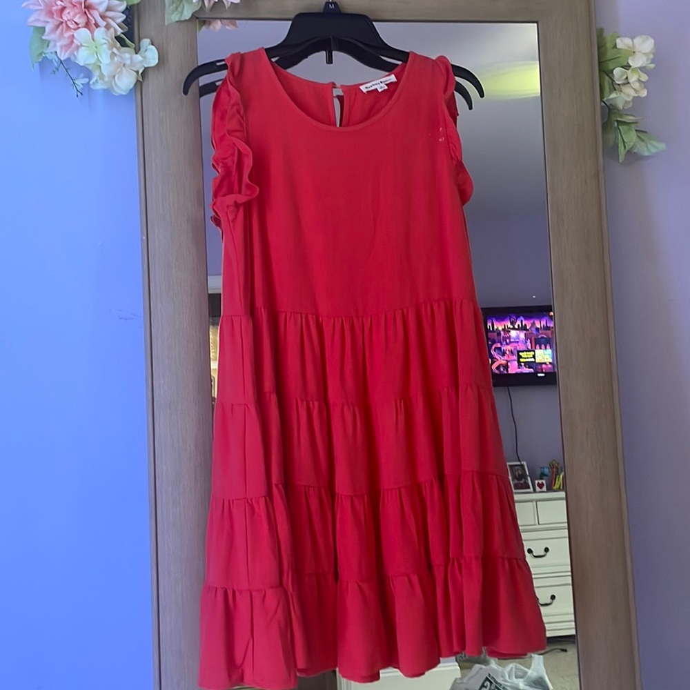 Coral dress with ruffles